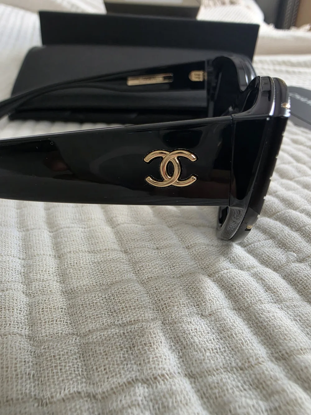 CHANEL Black Cat-Eye Sunglasses with Gold Trim